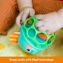 Teal elephant light-up rattle with green frame and textured orange-and-white ear details