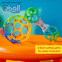 Two ring rattle balls with colorful plastic rings and clear bead chambers
