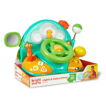 Bright Starts driver learning toy, teal shell with green wheel and orange/yellow control buttons