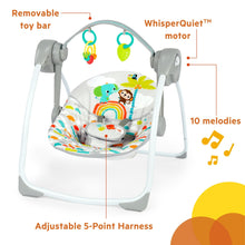 Baby swing with hanging toys, white seat cushion, and adjustable 5-point harness
