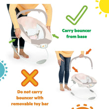 Portable baby bouncer with carry handle and removable toy bar shown