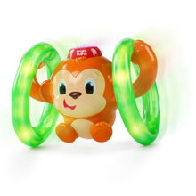 Monkey baby roll-and-glow toy with orange character and green light-up looping rings