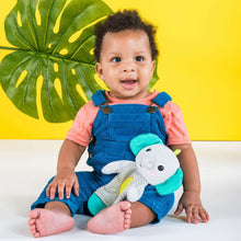 Elephant plush teether held by baby, teal ears and textured belly panel