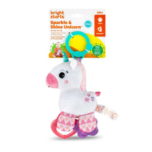 Sparkle unicorn clip-on plush toy with teal handle and pink geometric skirt