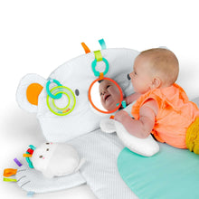 Polar bear tummy time mat with baby, teal play pad, and hanging ring toy