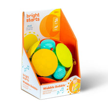 Wobble bobble crawl ball toy in retail box, green and yellow