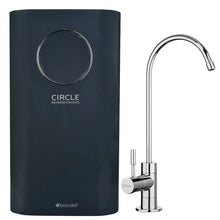 Water filtration system with circular logo on black housing and top panel
