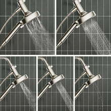 Handheld shower head showing multiple spray streams and water flow from nozzles
