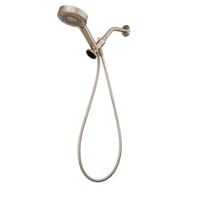 Handheld shower head with flexible hose and round spray face, metal finish