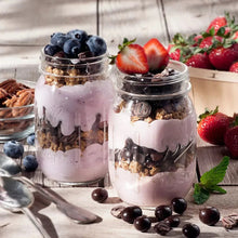 Brookside dark chocolate acai jars with blueberries, chocolate, and strawberry slices