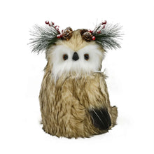 Plush owl tree topper with curly brown body, black beak, and red berry pine crown