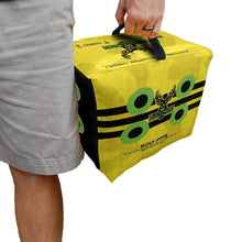 Yellow portable archery discharge target cube with carry handle and green bullseye circles