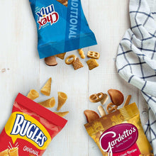 Assorted snack bags laid out on fabric: Bugles, Chex Mix, and Gardetto's