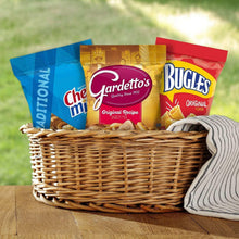 Wicker basket with assorted snack bags: Chex Mix, Gardetto's, and Bugles
