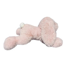 Light pink bunny plush lying down with rounded ears and long floppy feet