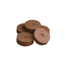 Compressed seed-starting pellets, brown coconut-fiber disks, loose round cluster