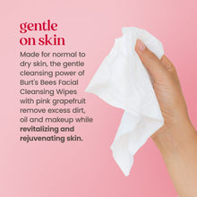Facial cleansing wipe held in hand, white sheet for everyday skin cleansing