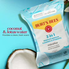 Micellar facial towelettes pouch with coconut half beside it