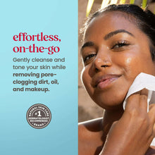 Micellar facial towelette used to cleanse a face, shown in close-up with white wipe