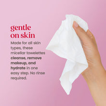 White micellar facial towelette held in hand