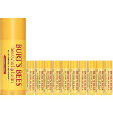 Lip balm set with one yellow tube and several small yellow balm tubes