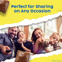 Chocolate candy bar pieces with crumbled topping, visible near the top of the scene.