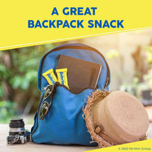 Butterfinger candy bars in a blue backpack pocket, yellow wrappers partially visible.