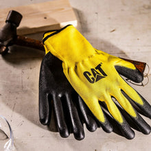 Yellow and black work gloves with CAT logo, black textured grip fingers