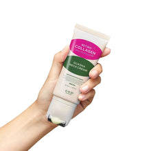 Guasha neck cream tube in hand, beige container with pink and green label
