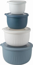 Stacked ribbed meal prep containers with lids in white and blue-gray