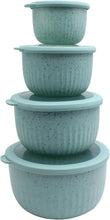 Mint speckled nesting meal prep bowls with lids, stack of three