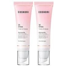 Pair of pink tone-up cream tubes with silver caps and front labels