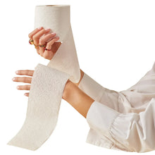 Caboo bamboo bath tissue sheet held in hands, Tree Free TP