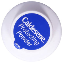 Close-up of protective logo seal with “Protecting Powder” on a blue label