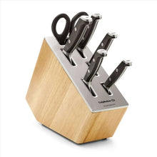 Knife set in wood block with five black-handled knives