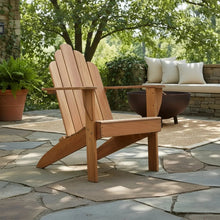 Teak Adirondack chair side view with slatted backrest, armrests, and slanted base