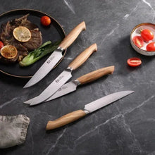4 steak knives with light wood handles and pointed stainless blades
