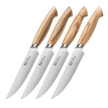 4 steak knives with Swedish steel blades and light wood handles