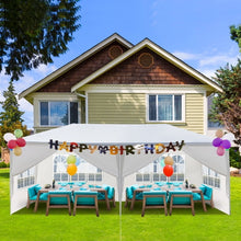 White pop up canopy tent with window sidewalls and Happy Birthday banner across top