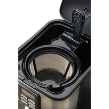 Capresso coffee maker open lid area showing filter basket and brew tube
