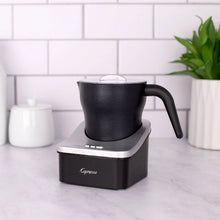 Capresso Automatic Milk Frother in black and silver with handle frothing pitcher