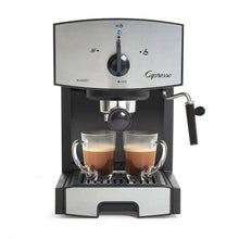 Espresso machine with black body, metal drip tray, two glass cups, steam dial