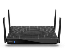 Black Linksys mesh WiFi router with vented top panel and four antennas.