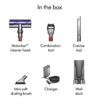 Cordless vacuum accessories in box: cleaner head, combo tool, crevice tool, charger