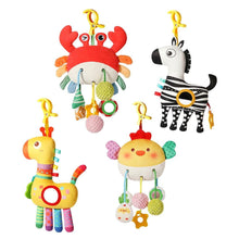 Set of baby hanging animal toys: red crab plush, yellow character, zebra, and dragon-style