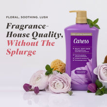 Purple body wash bottle with gold pump beside flowers; fragrance house quality text
