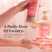 Hand dispensing Caress Daily Silk body wash from a pump bottle.