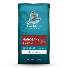 Ground coffee bag in teal, labeled Mahogany Blend, dark roast, net wt 12 oz