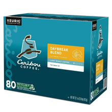K-Cup coffee box angled view with Daybreak Blend label, Caribou logo, and 80 recyclable pods.