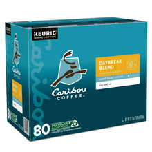 K-Cup coffee box with teal design, Caribou logo, Daybreak Blend label, and 80 pods.